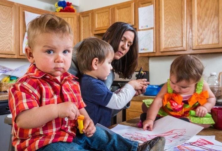 Busy Mom Holding Kids