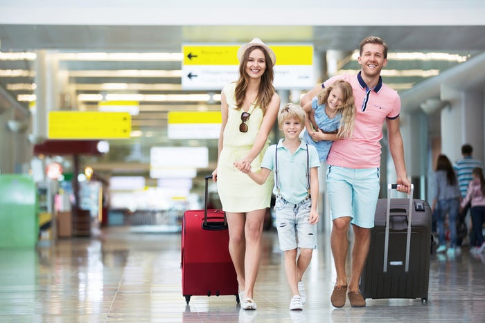 Family Preparing to Travel Together Family Preparing to Travel Together