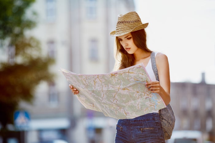 Woman looking at map