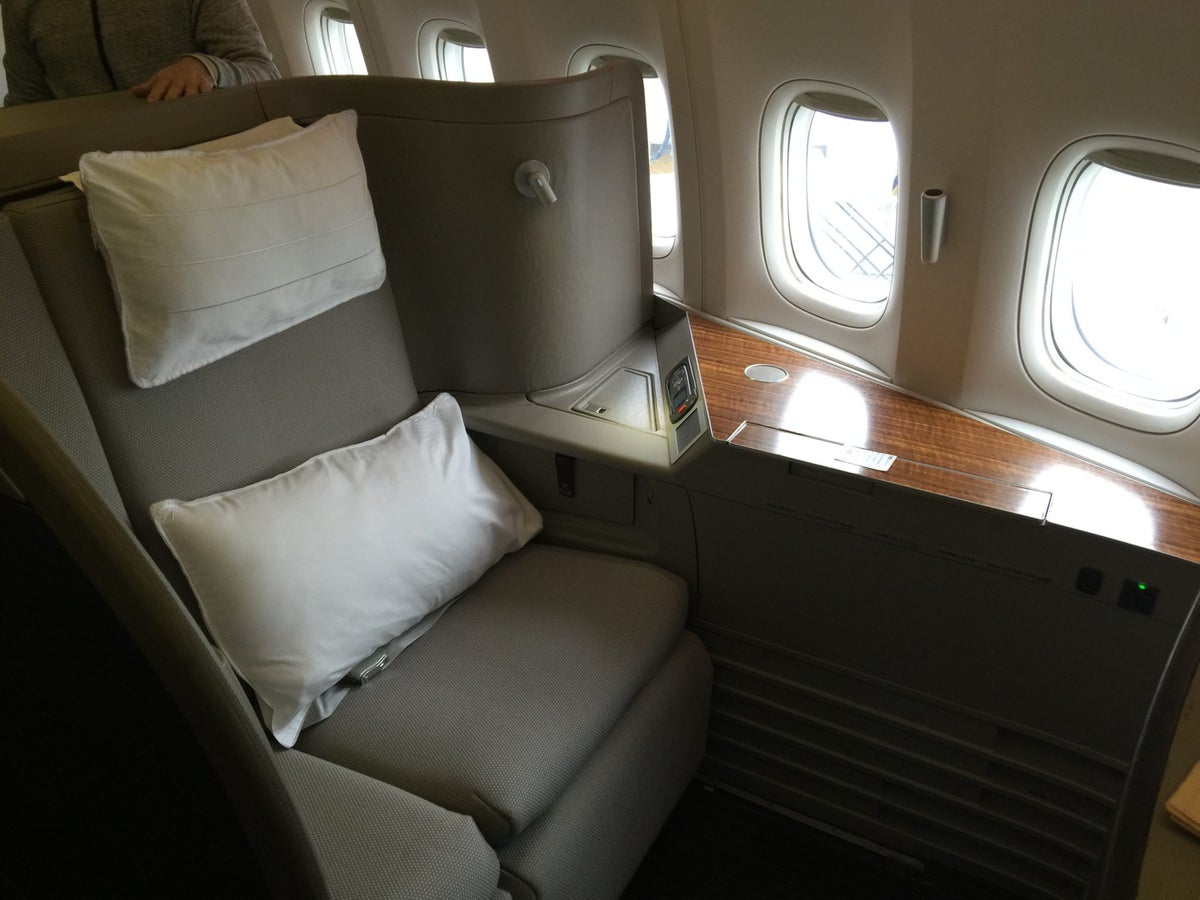 Use Cathay Pacific to fly American Airlines business class to Frankfurt!