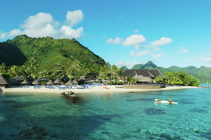 Hilton Moorea Lagoon Resort & Spa Hilton Moorea Resort Beach With Canoe