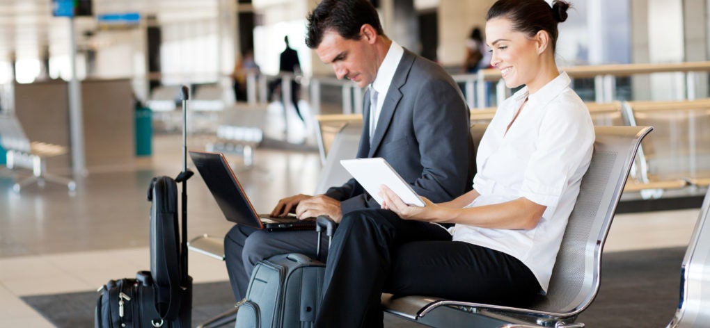 airport laptop couple
