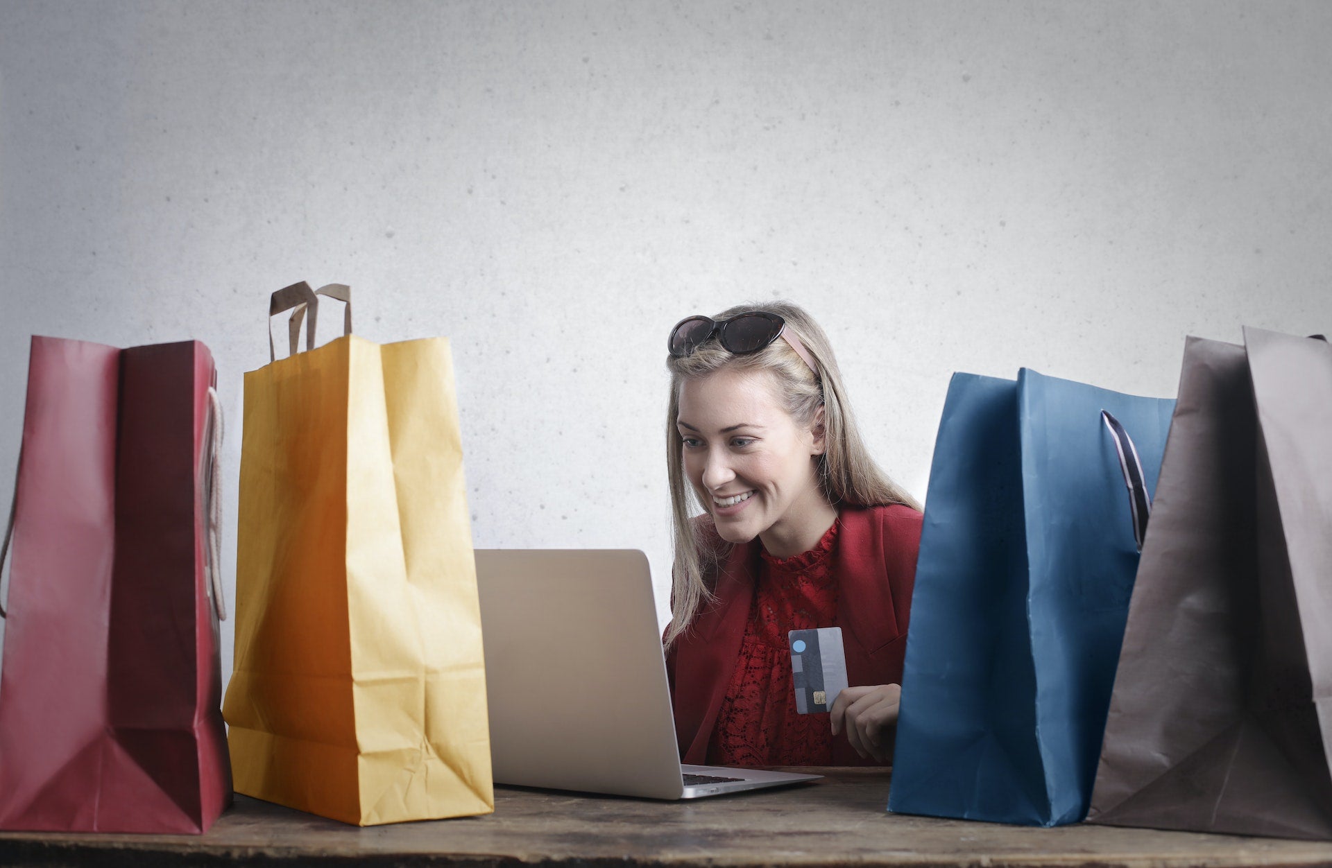 Woman shopping on laptop