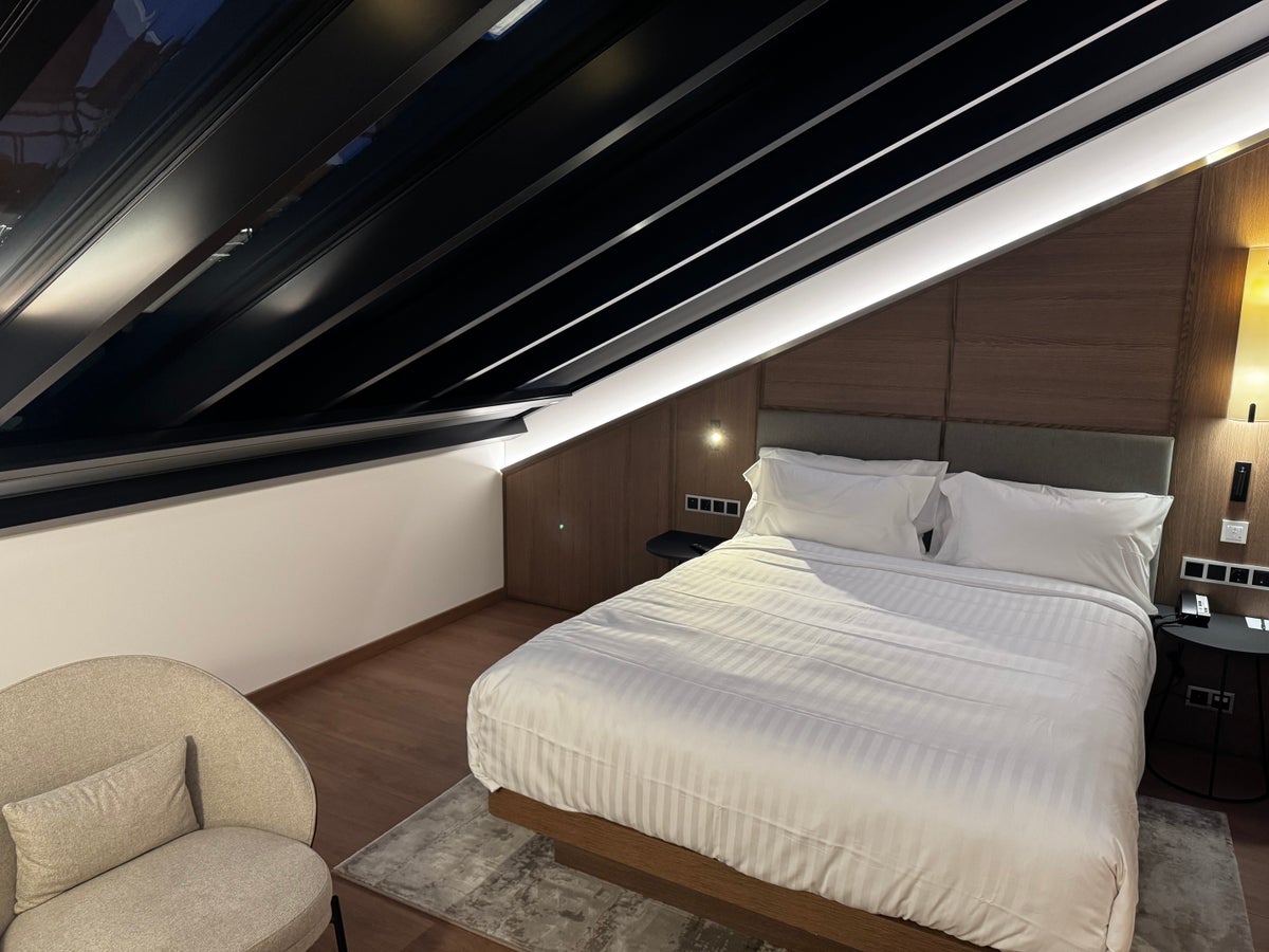 AC Hotel Vilnius Attic Junior Suite bed