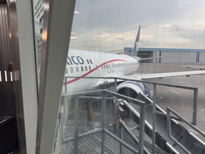 Aeromexico plane view jet bridge Aeromexico plane view jet bridge