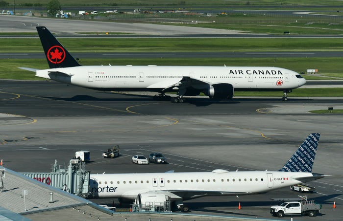 Air Canada B777 300ER Porter E295 Toronto YYZ Air Canada B777 300ER Porter E295 Toronto YYZ