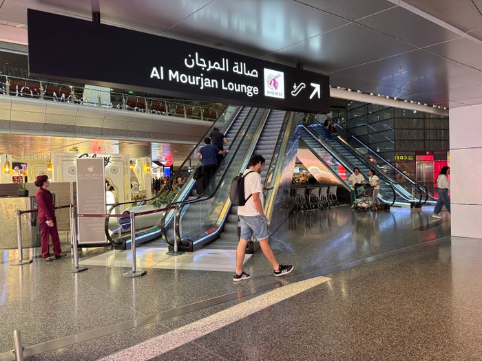 Al Mourjan Lounge DOH signage up escalators Al Mourjan Lounge DOH signage up escalators