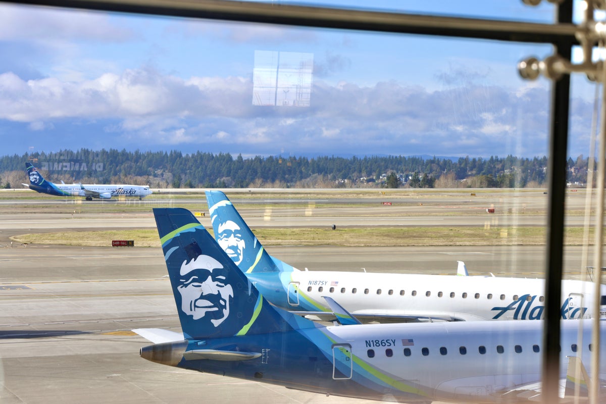 Alaska Airlines Tails and 737 on Runway