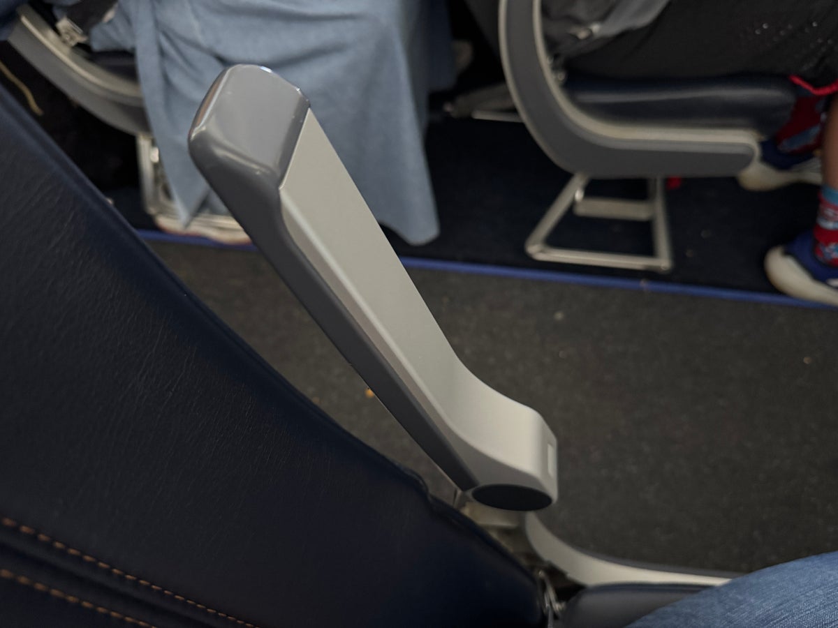 Allegiant A320 AVL HOU adjustable armrest