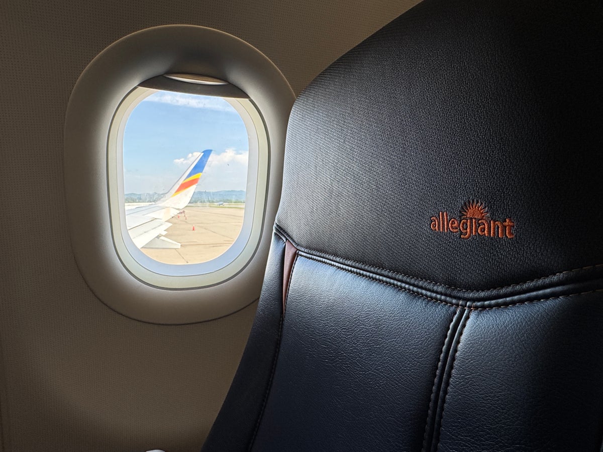 Allegiant A320 AVL HOU logo headrest wingtips