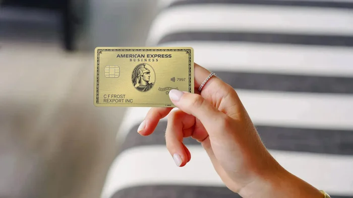 Amex Business Gold card in hand Amex Business Gold card in hand