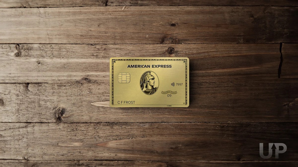 Amex Gold Card Wood Background Upgraded Points LLC