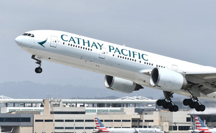Cathay Pacific 777 300ER takeoff LAX American Airlines