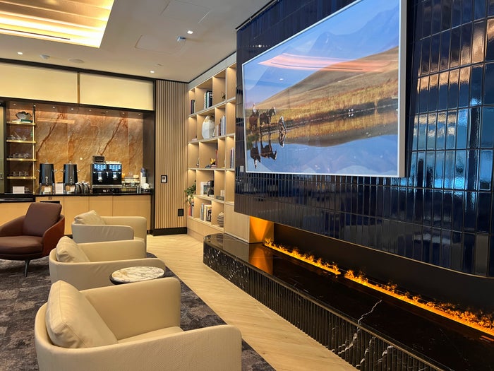 Chase Sapphire Lounge Dallas DFW fireplace area Chase Sapphire Lounge Dallas DFW fireplace area