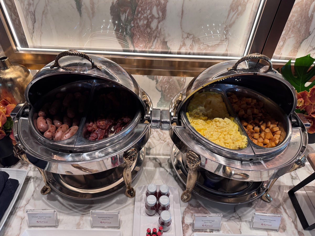 Conrad Las Vegas Club 66 breakfast chafing dishes with sausage eggs and potatoes