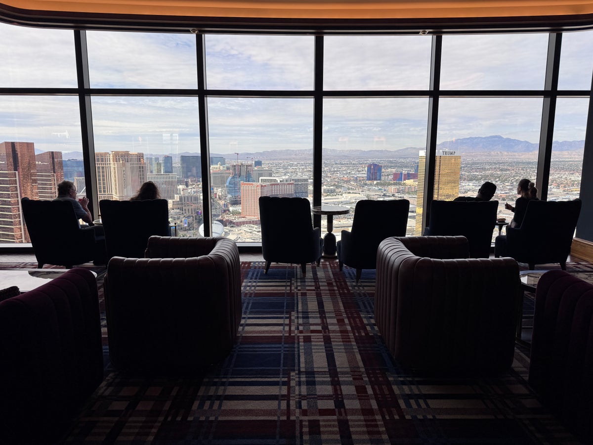Conrad Las Vegas Club 66 breakfast lounge guests seated with full Strip skyline view