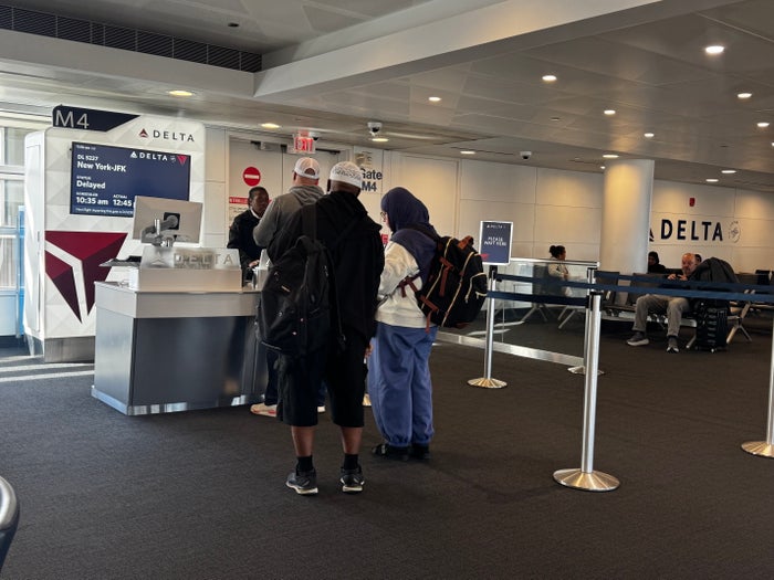 Delta customers at gate Delta customers at gate