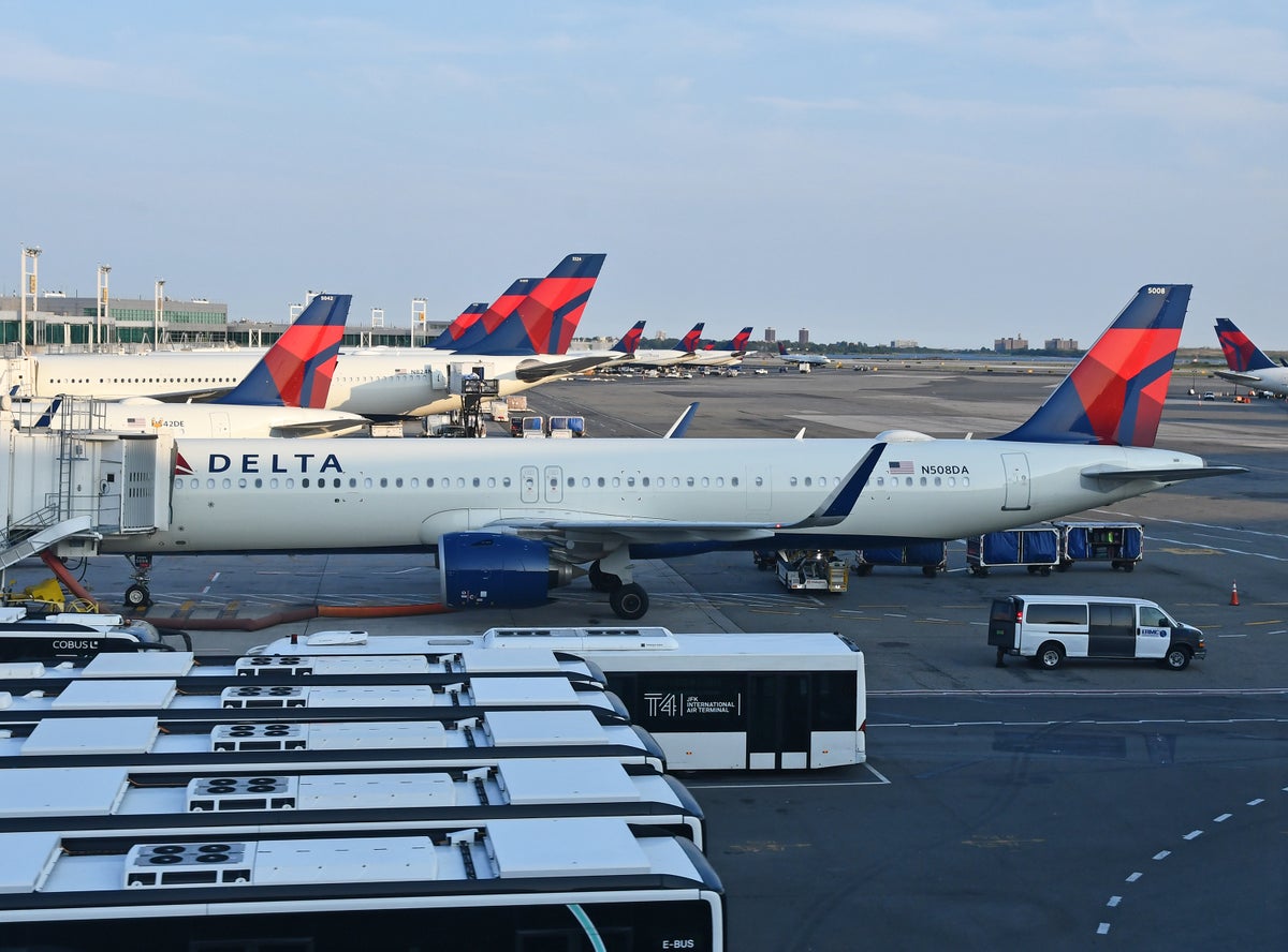 Delta planes docked JFK Terminal 4 Delta planes at the gate in New York (JFK)'s Terminal 4