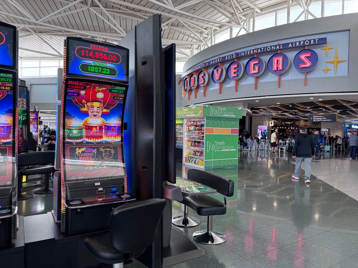 Harry Reid International Airport LAS terminal slot machines Vegas signage