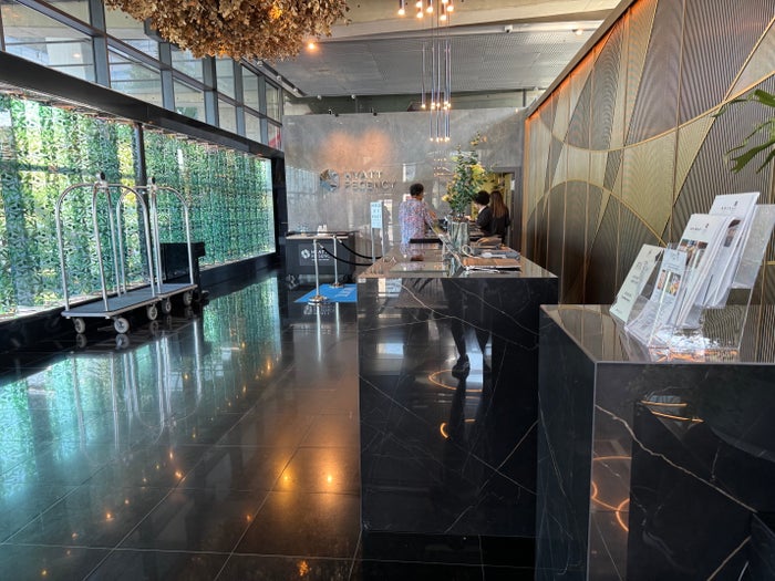 Hyatt Regency Barcelona Tower reception side view