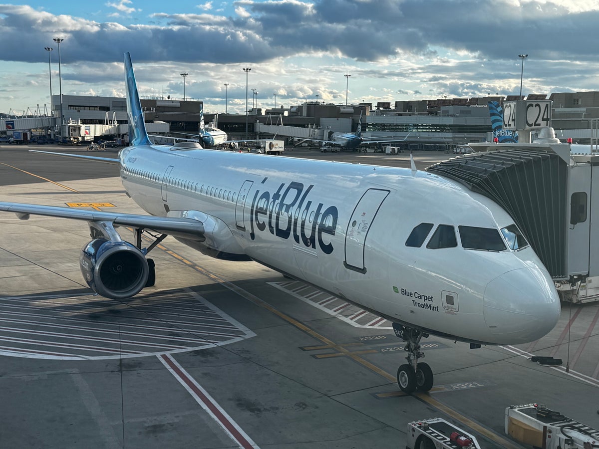 JetBlue A220 at gate BOS closeup