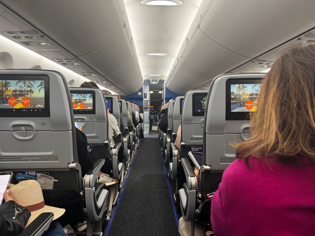 JetBlue A220 economy view up aisle