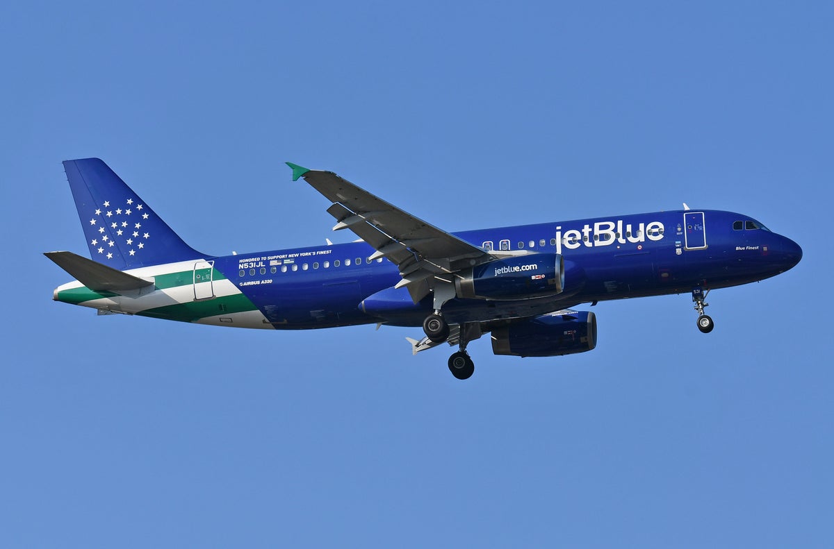 JetBlue New Yorks finest special colors A320 landing JFK JetBlue New Yorks finest special colors A320 landing JFK