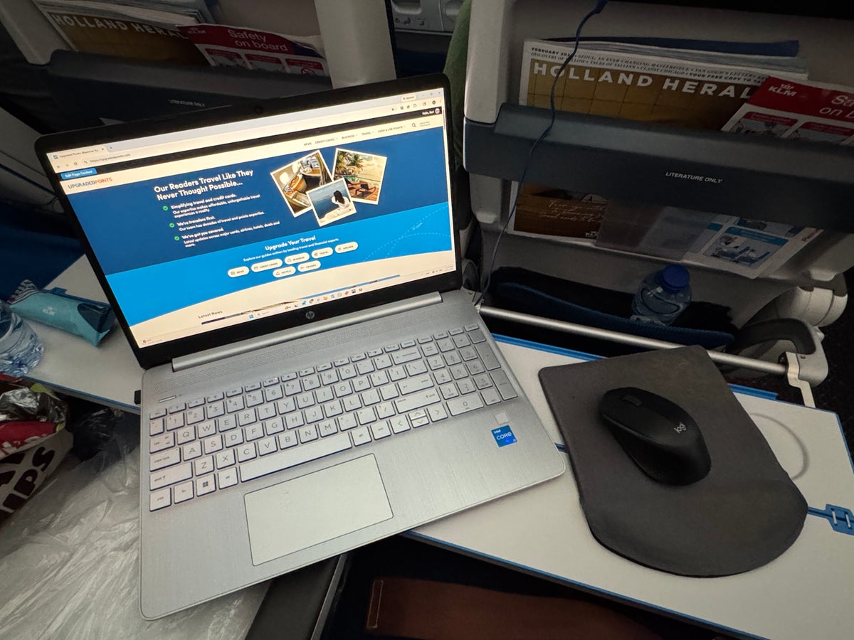 KLM 787 10 economy IAH AMS laptop across 2 tray tables