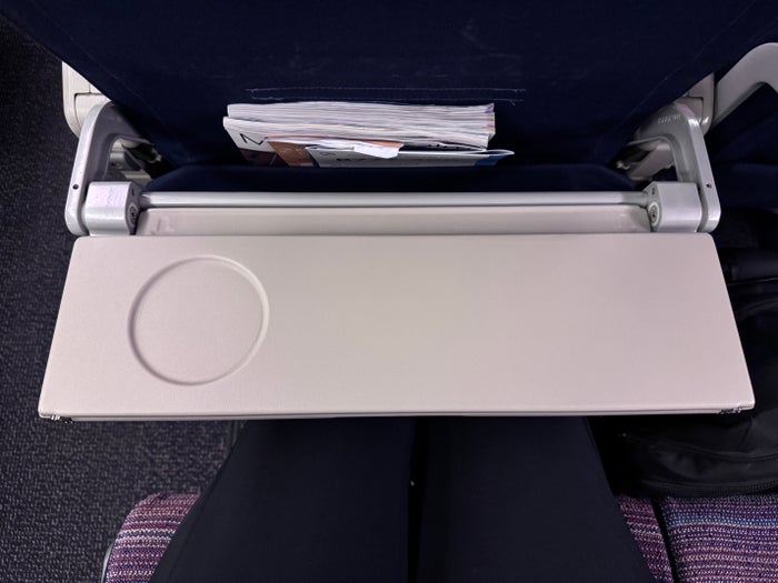 Korean Air B777 300 LHR ICN economy tray table half