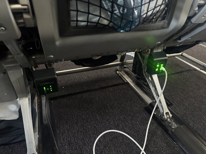 LATAM A320 Premium Economy Power Outlet In Use LATAM A320 Premium Economy Power Outlet In Use