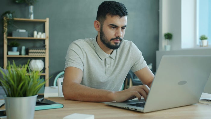 Man using laptop computer