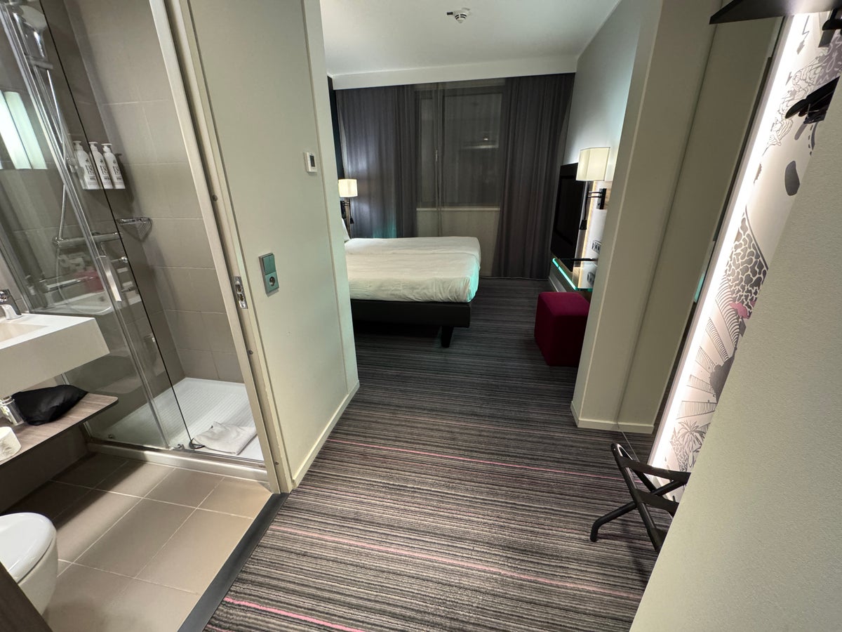 Moxy Paris Charles de Gaulle Airport twin beds Moxy Paris Charles de Gaulle Airport room from entry
