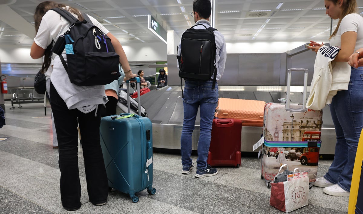 Passengers Collecting Checked Baggage Upgraded Points LLC