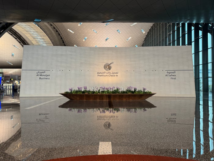 Qatar Airways business first DOH airport premium check in Qatar Airways business first DOH airport premium check in
