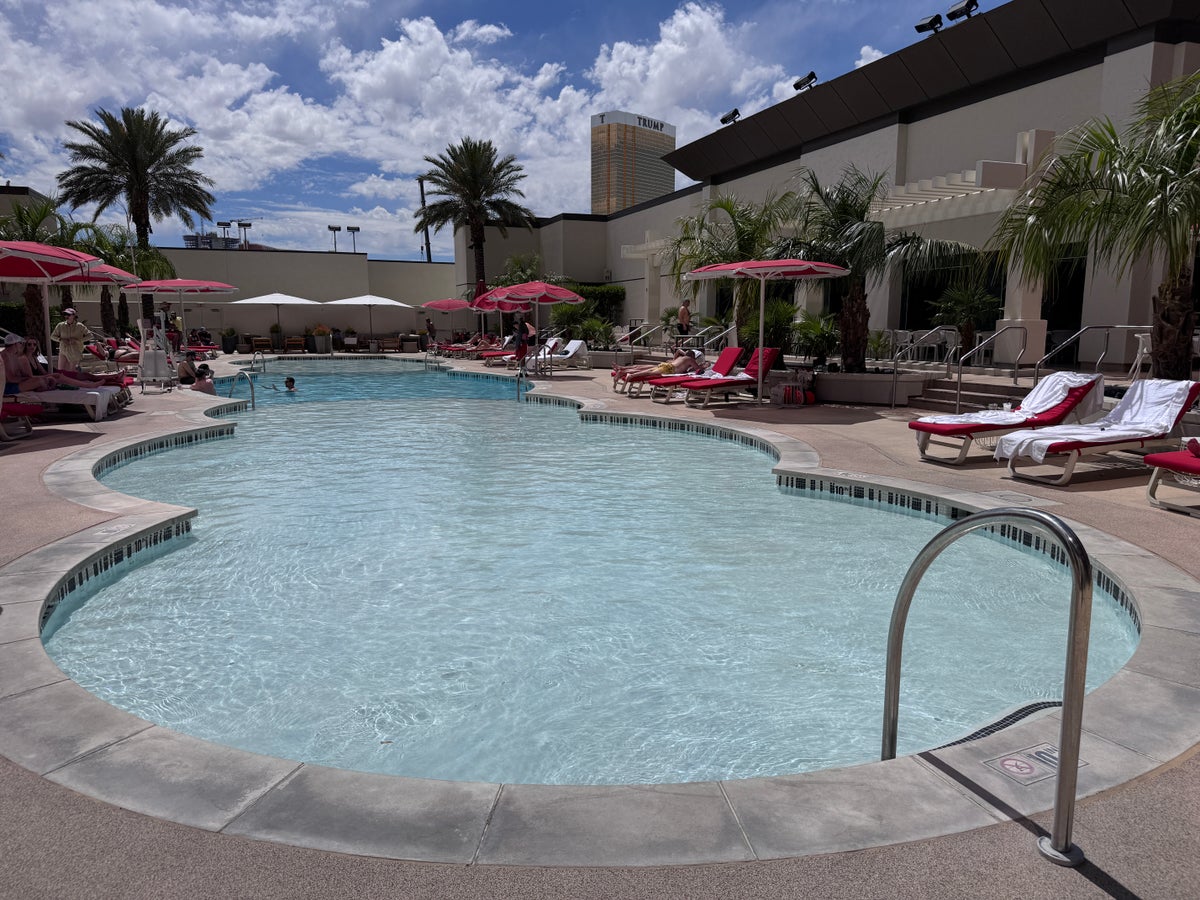 Resorts World Las Vegas pool smaller quiet pool with lounge chairs Resorts World Las Vegas pool smaller quiet pool with lounge chairs