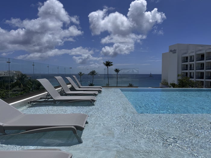 Royalton Vessence Barbados rooftop pool sunny