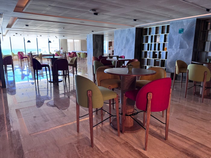 Secrets Mirabel Cancun Bar Seating Colorful Stools