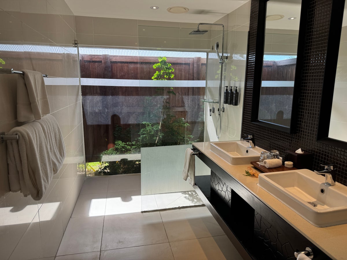 Sheraton Tokoriki Island Bathroom with double sinks rain shower garden view