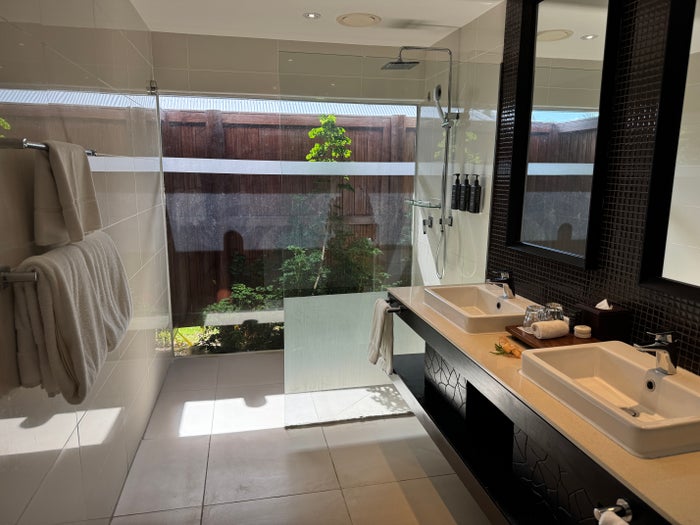 Sheraton Tokoriki Island Bathroom with double sinks rain shower garden view