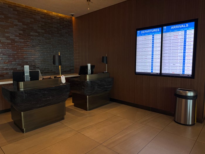 Soho Lounge JFK left Soho right Chelsea Soho Lounge JFK departures board