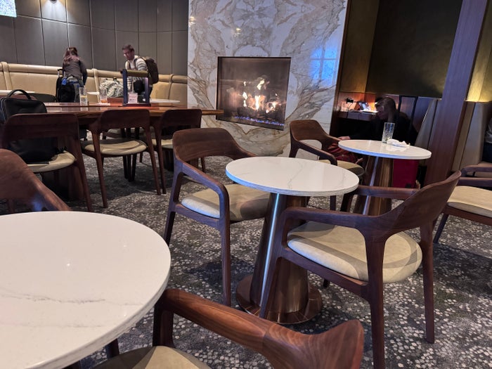 Soho Lounge JFK fireplace seats Soho Lounge JFK fireplace seats
