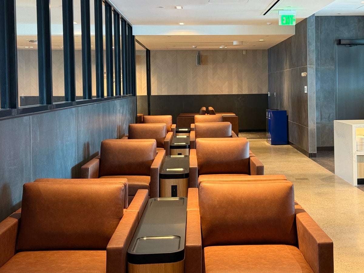 United Club Denver B West Saddle Armchairs
