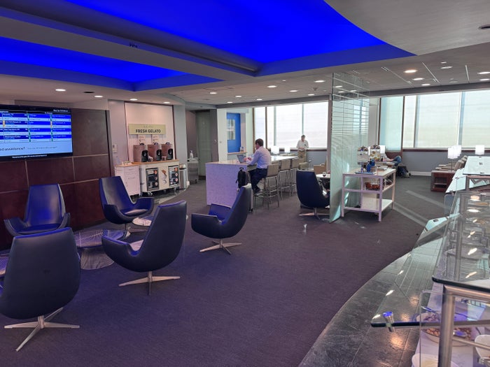 United Club MCO seating by buffet