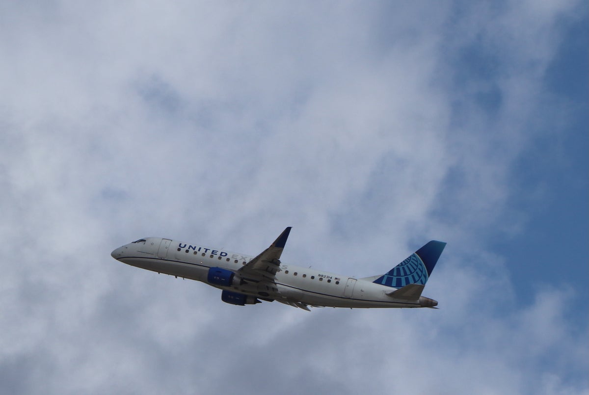 United Express E175 takeoff clouds ATL