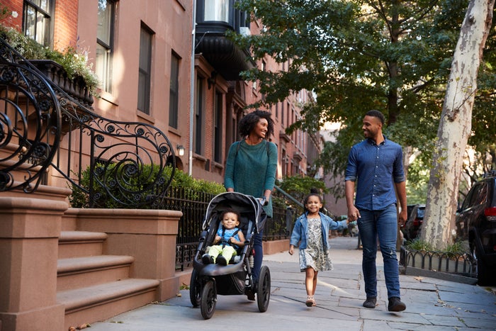 Family Traveling With Stroller