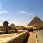 Cairo pyramids with tourists