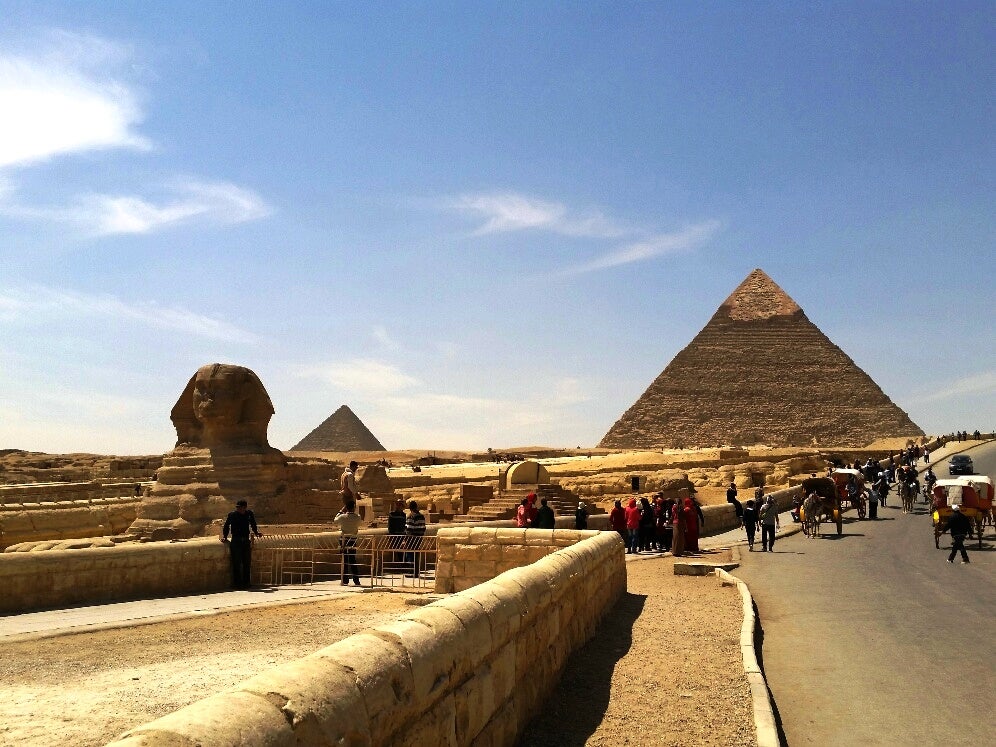 Cairo pyramids with tourists