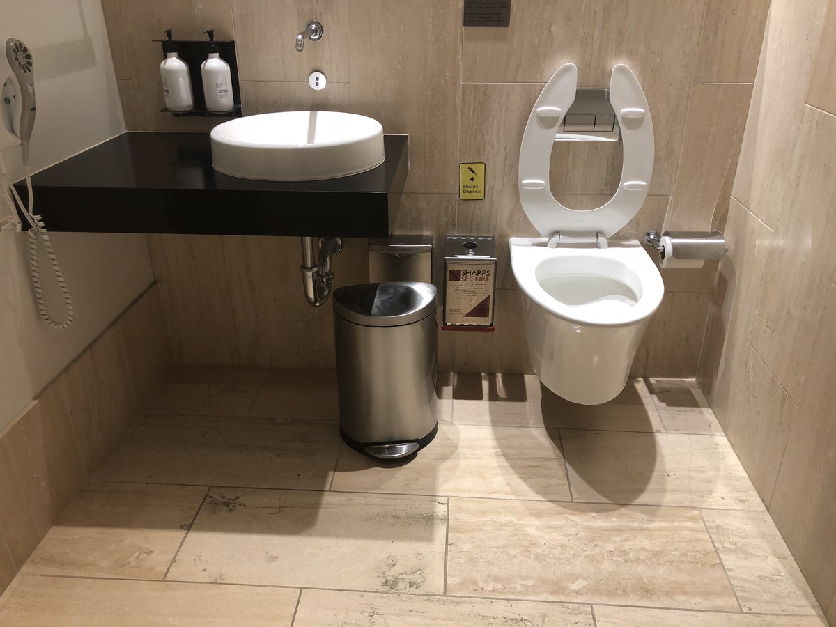 Sink and Toilet in Oneworld Business Class Lounge