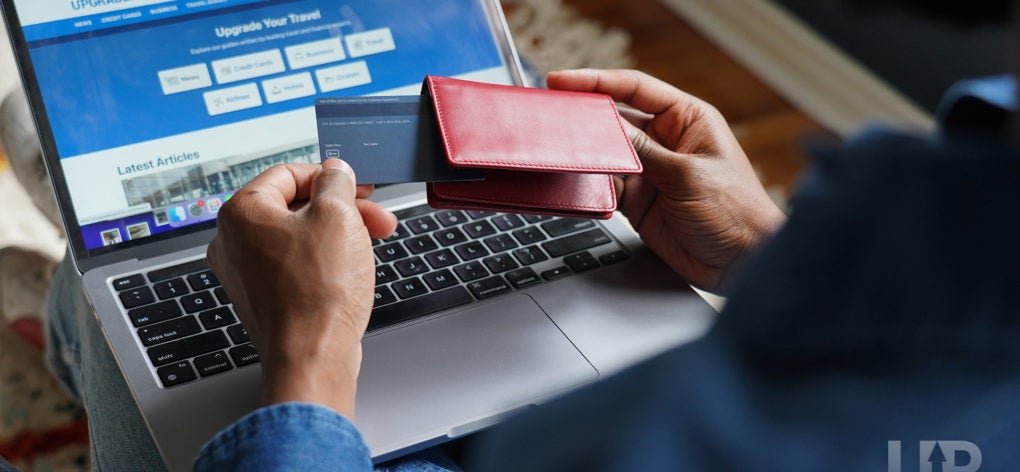 Credit Card infront of laptop 2 Upgraded Points LLC