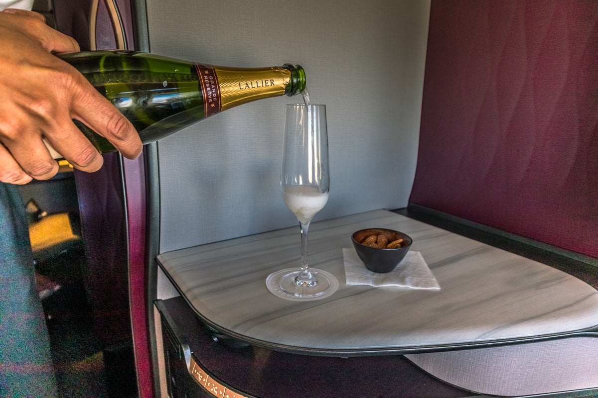 Qatar Airways Boeing 777 Qsuite Business Class Champagne